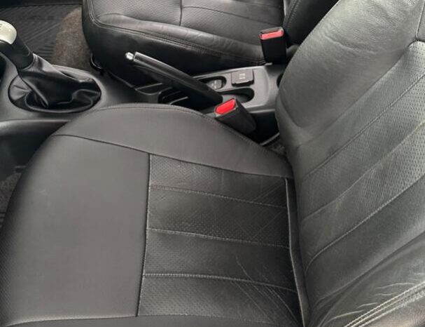 Nissan Versa completo